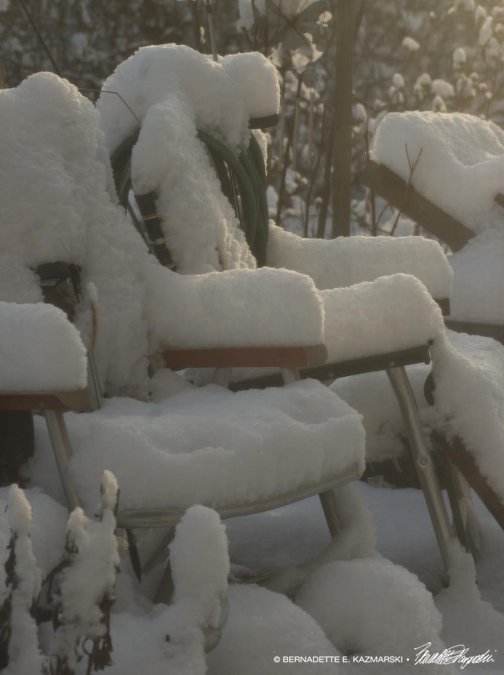 snow on lawn chairs