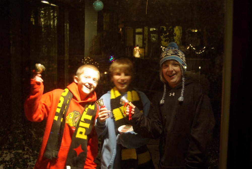 carolers at the door