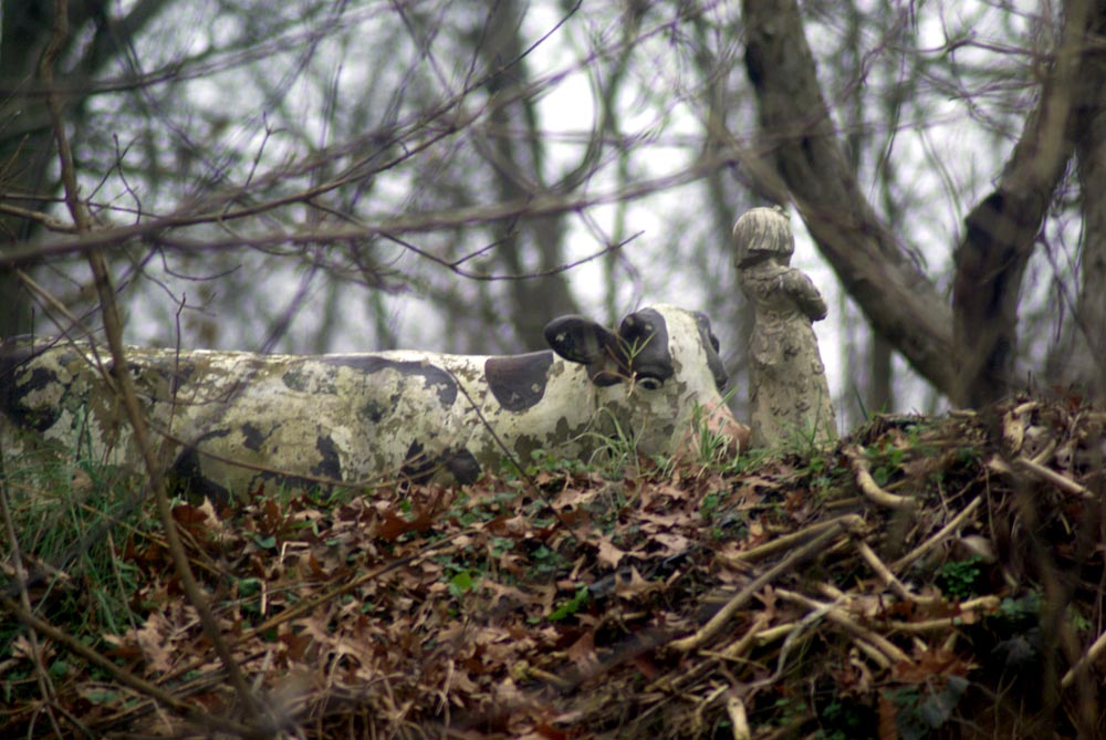 two concrete figurines