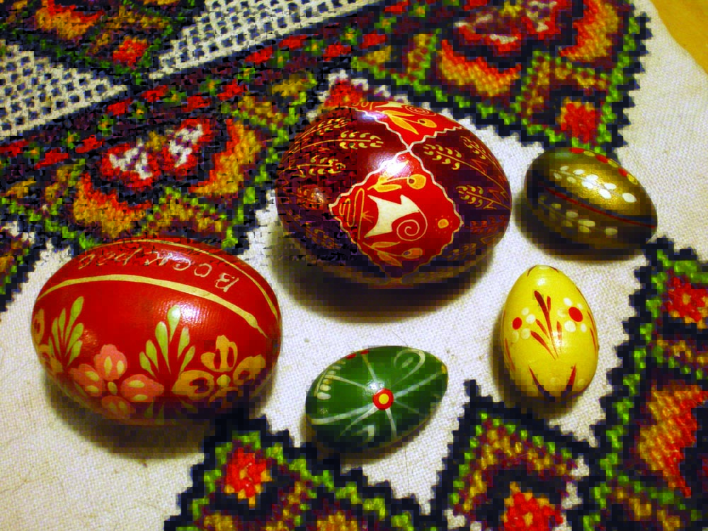 photo of pysanky on traditional cross-stitch cloth