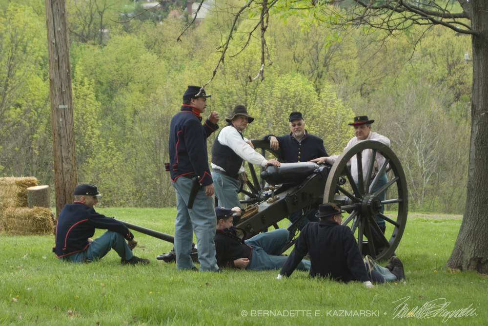 civil war re-enactors waiting around cannon
