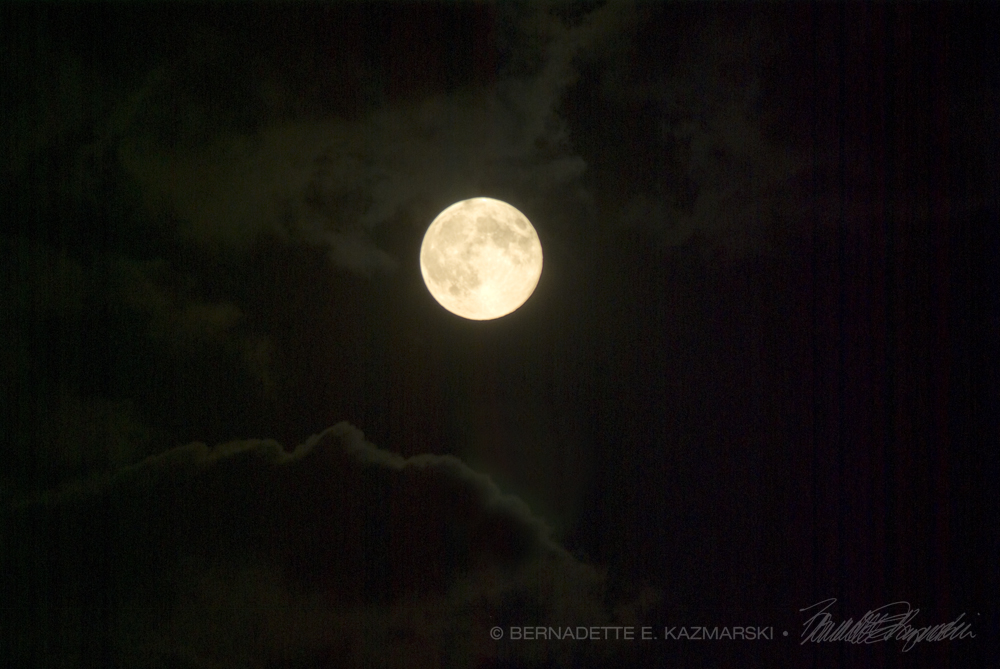 supermoon with clouds